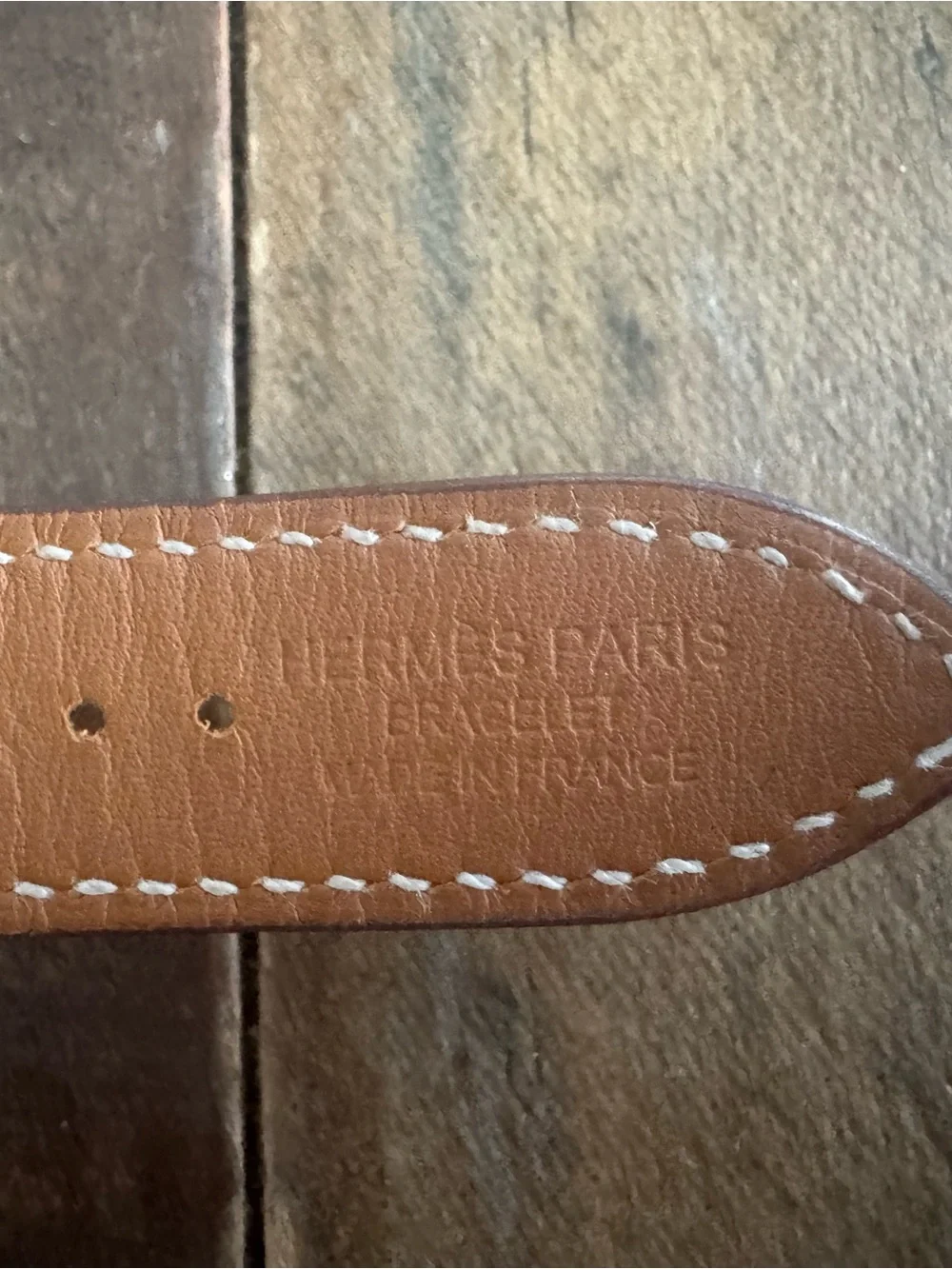 Hermes Apple Watch with orange and double tour leather bands